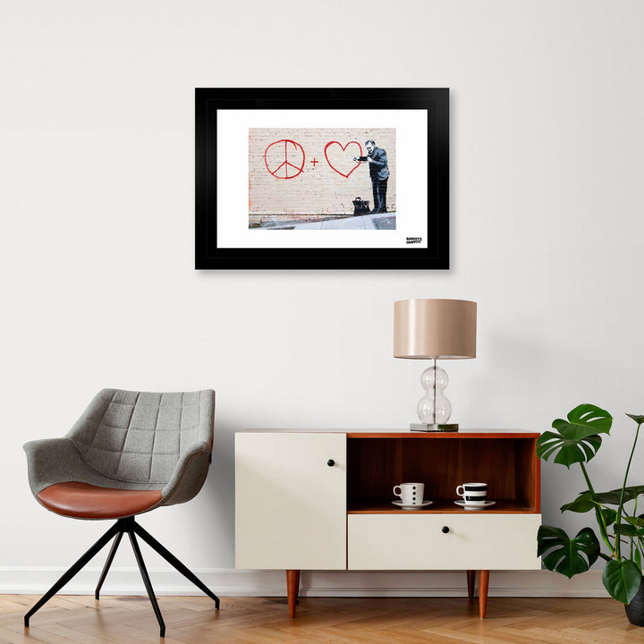 CND Doctor, a framed print of Banksy's Graffiti-Homekor Mounted in a cozy room