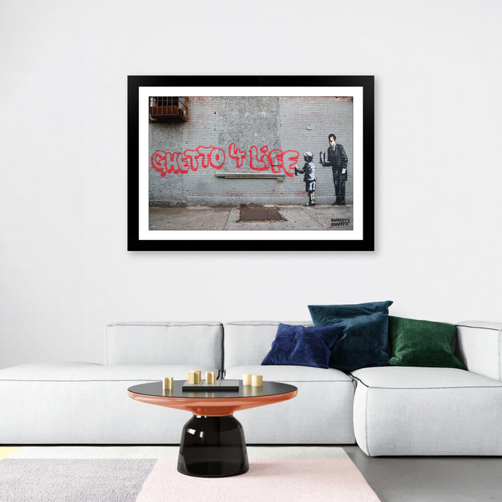Ghetto 4 Life, a framed print of Banksy's Graffiti-Homekor Mounted in a cozy room