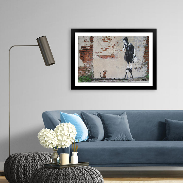 Girl on a Stool, a framed print of Banksy's Graffiti-Homekor Mounted in a cozy room