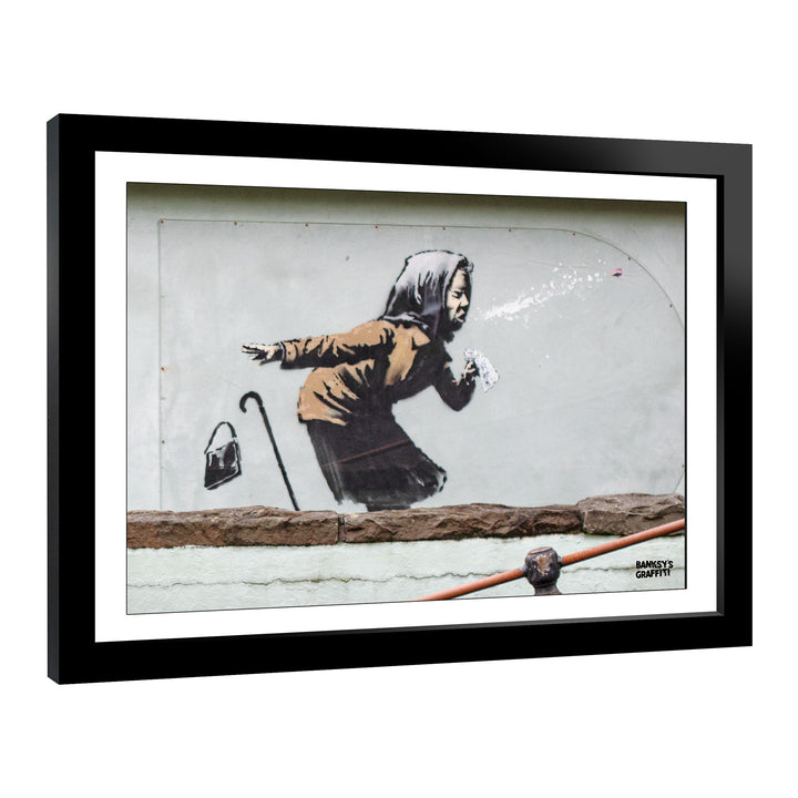 Achoo, a framed print of Banksy's Graffiti-Homekor