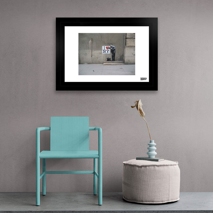 New York Doctor, a framed print of Banksy's Graffiti-Homekor Mounted in a Minimalistic room