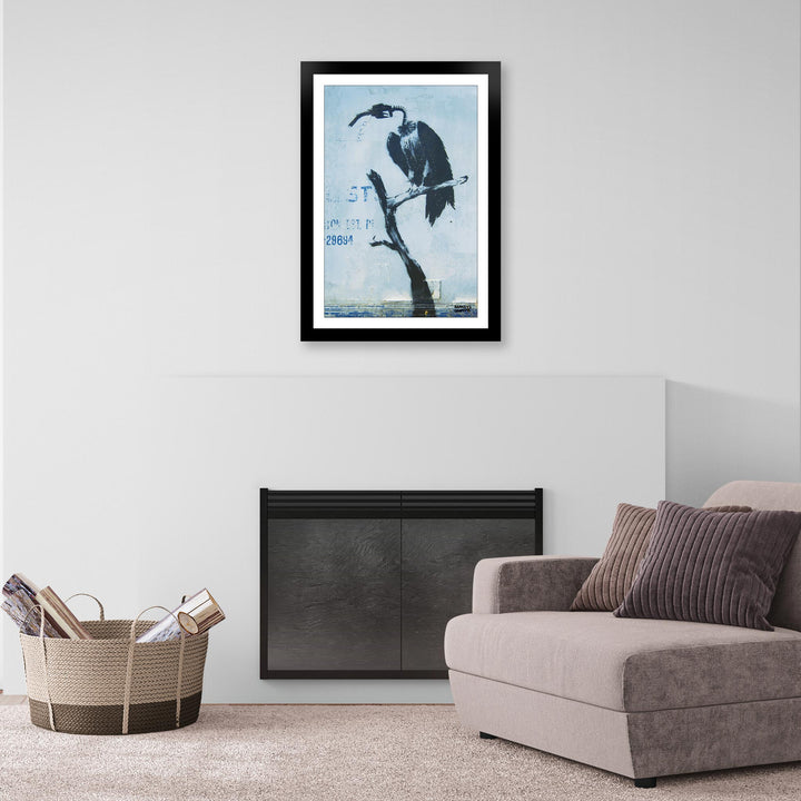 Petrol Head, a framed print of Banksy's Graffiti-Homekor Mounted in a cozy room