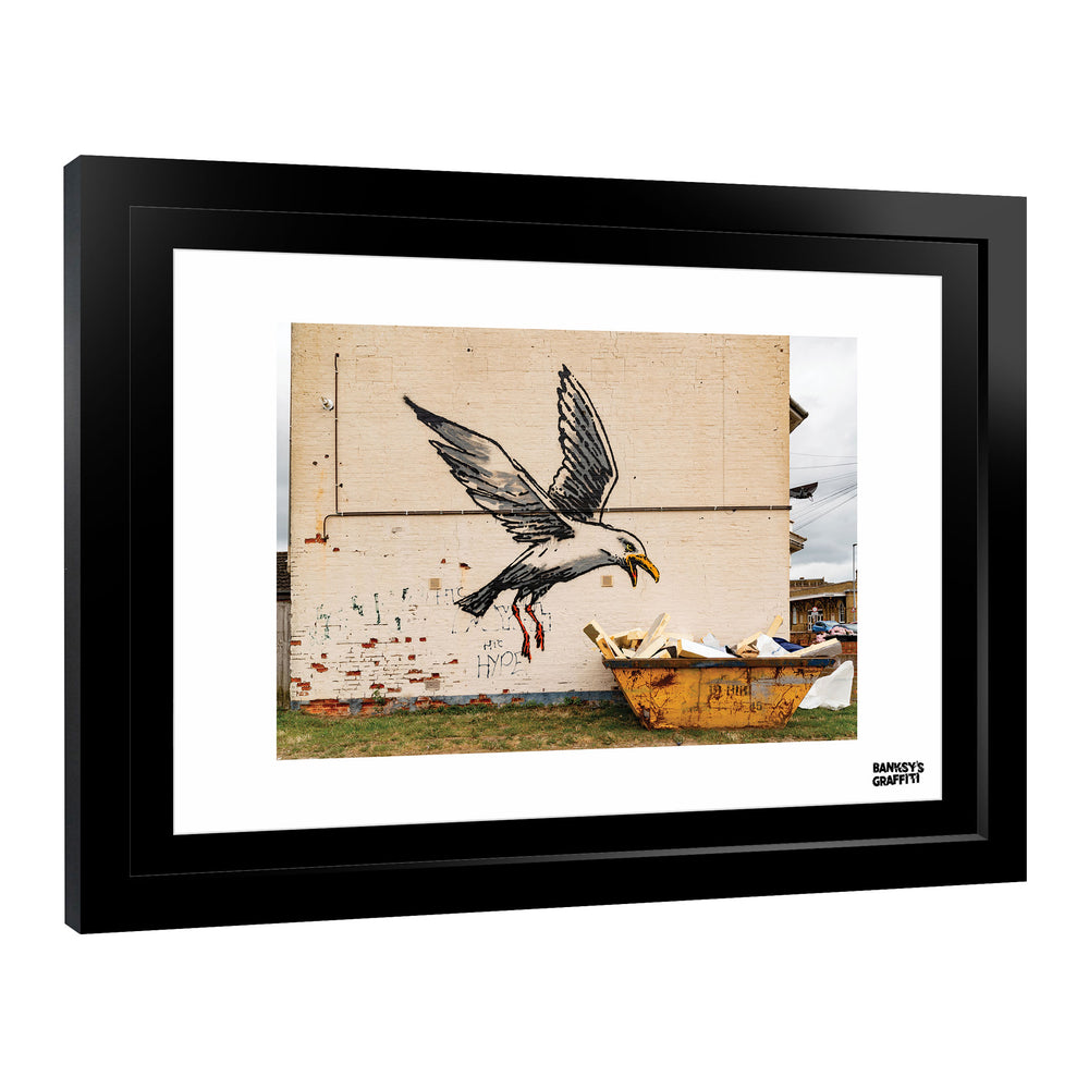 Seagul Raiding a Dumpster, a framed print of Banksy's Graffiti-Homekor