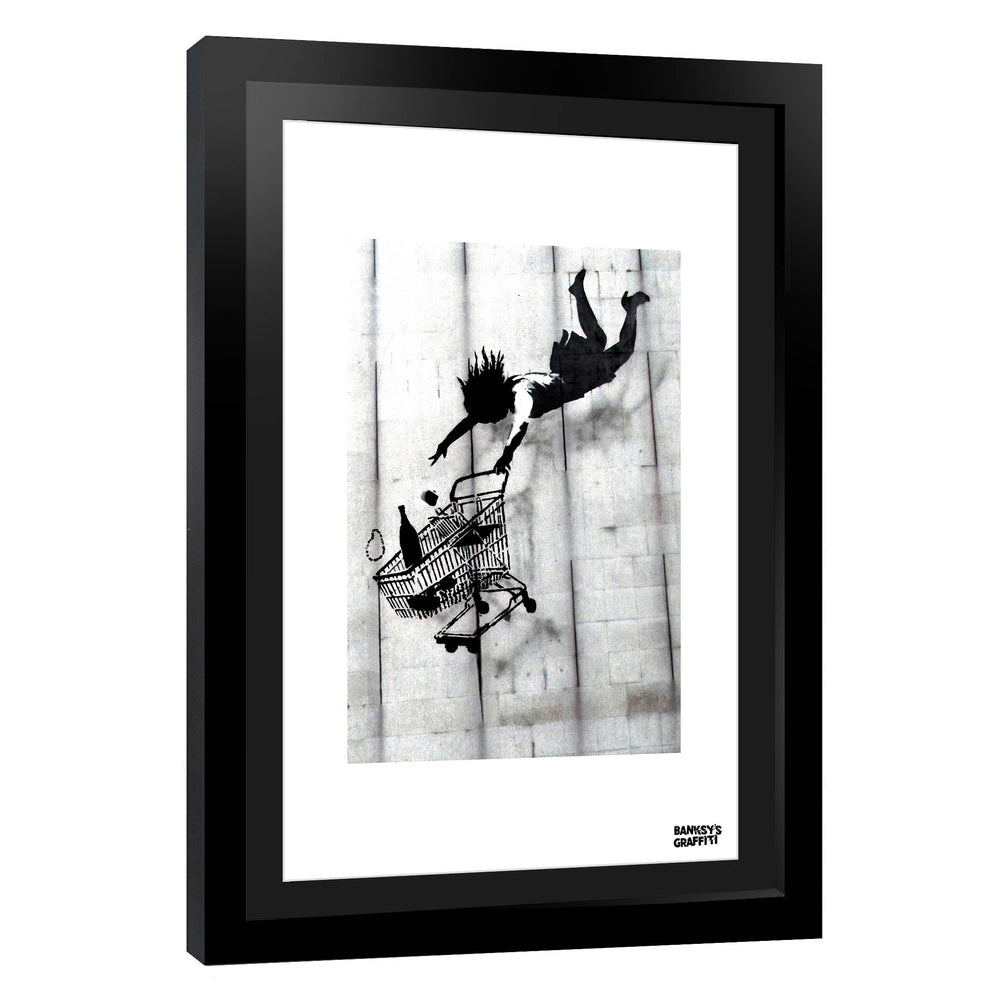 Shop till you Drop, a framed print of Banksy's Graffiti-Homekor