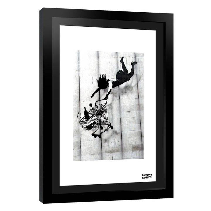 Shop till you Drop, a framed print of Banksy's Graffiti-Homekor