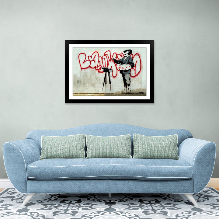 The Bubble Artist, a framed print of Banksy's Graffiti-Homekor Mounted in a cozy room