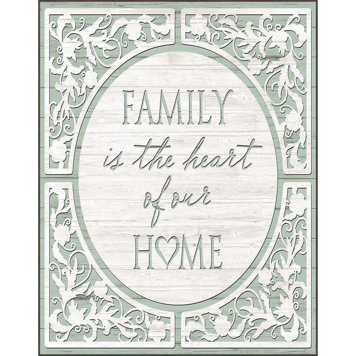 Framed wall art; reads: Family is the heart of our home.