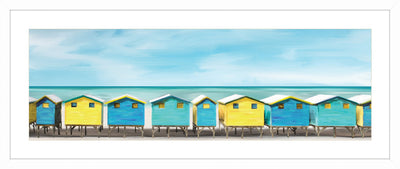 Beach homes along side the sand; framed wall art.